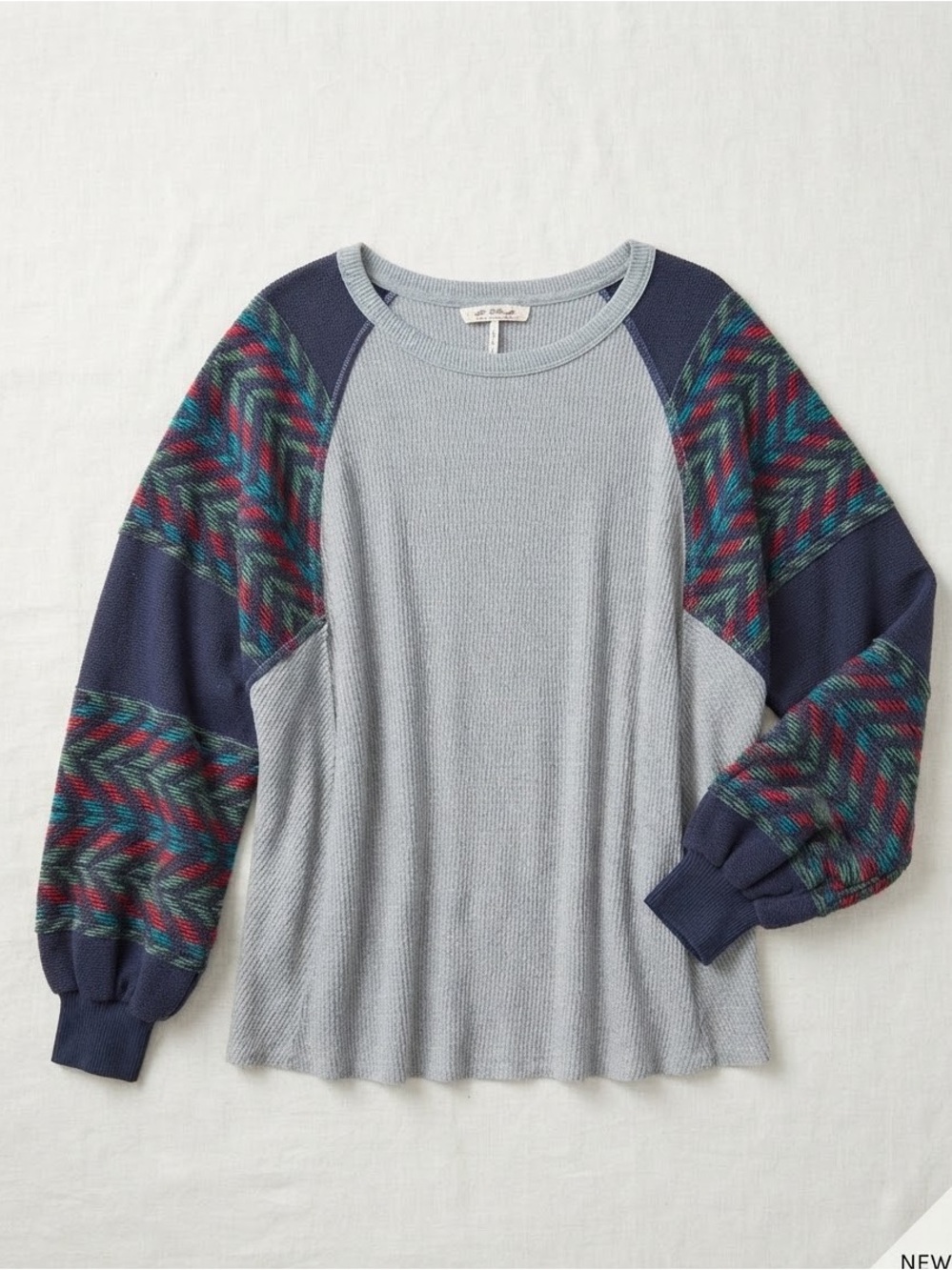 Light Blue Waffle-Knit Sweater with Patterned Navy Sleeves
